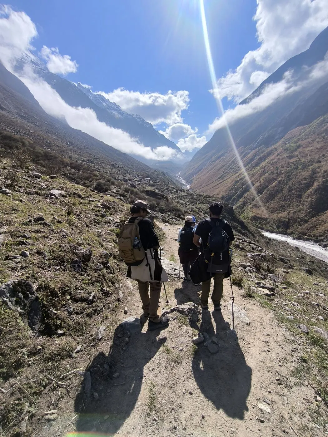 Two trekkers walking the trail high in the Langtang valley
